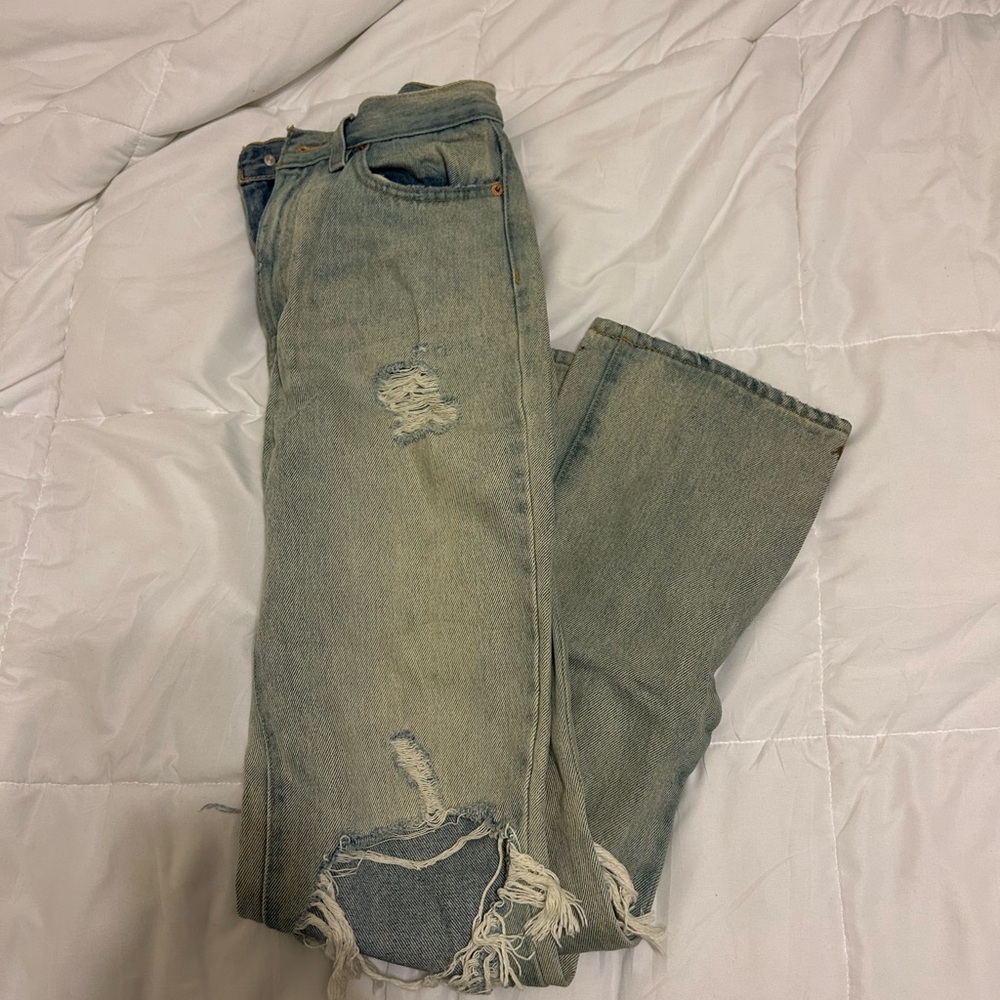 Distressed Light Blue Jeans